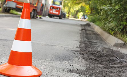 closeup of warning cone on roadway